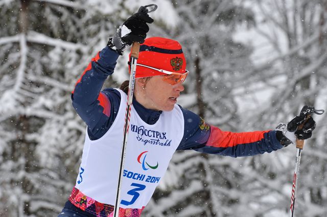 Елена Ремизова в спринтерской гонке в классе B 1-3 (слабовидящие) среди женщин на XI Паралимпийских зимних играх в Сочи.