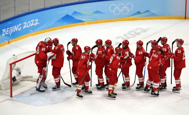 Российские спортсмены после матча группового этапа по хоккею среди мужчин между сборными командами ОКР и Швейцарии на XXIV зимних Олимпийских играх