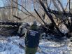 Сотрудник Следственного комитета РФ на месте падения самолёта Ан-2 в районе села Коряки Елизовского муниципального района