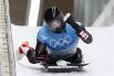 Александер Шлинтнер (Австрия) во время соревнований по скелетону среди мужчин на XXIV зимних Олимпийских играх