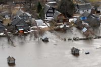 На фото - Тургиновское сельское поселение в 2013 году. Тогда в Тверской области случился мощный паводок. 