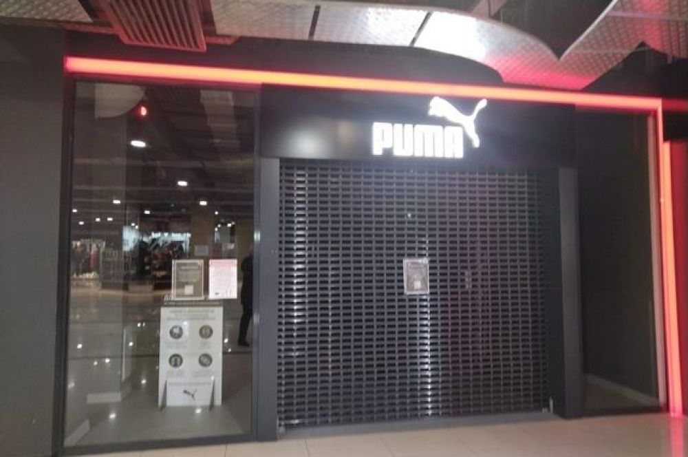 Закрыты и бутики немецкого производителя спортивной одежды Puma.