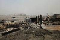 Огонь уничтожил или повредил 518 жилых домов.