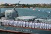 Офицеры и матросы на палубе сторожевого корабля проекта 1135М «Пытливый» на репетиции парада ко Дню Военно-морского флота РФ в Севастополе, 23 июля 2021 года