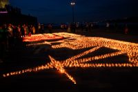 Вечером 21 июня горожане приняли участие в акции «Огненные картины войны».
