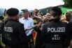 Активисты, выступающие против G7, принимают участие в акции протеста возле замка Эльмау в Баварских Альпах
