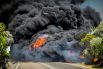 Тушение лесного пожара на полуострове Пелопоннес в Греции