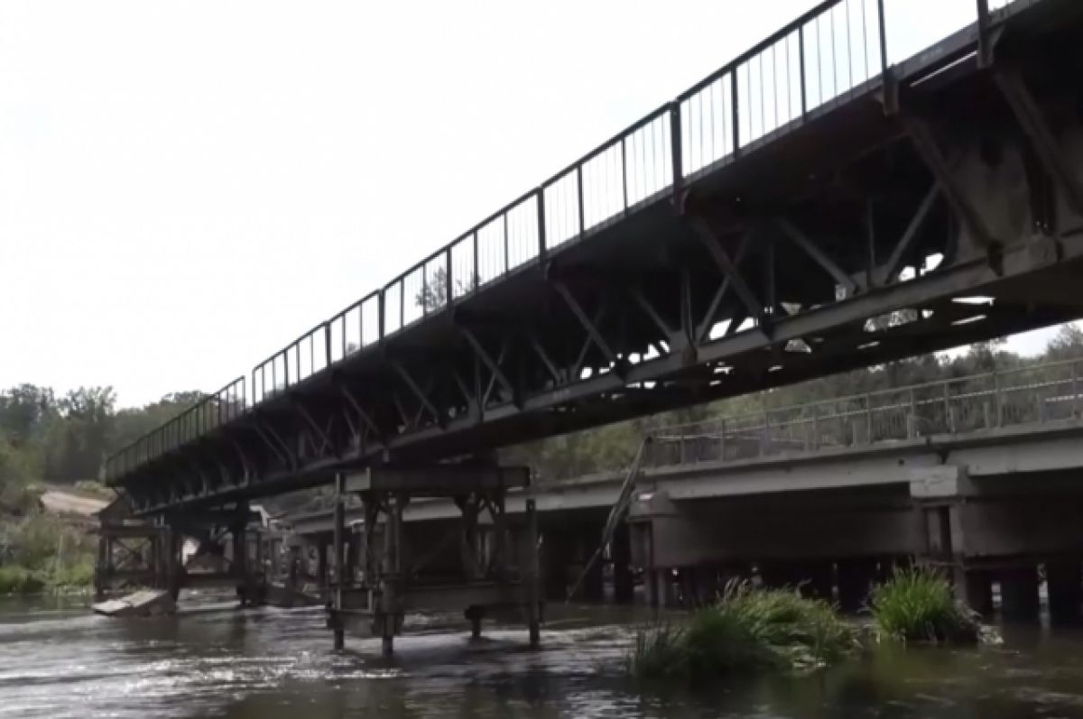 Минобороны РФ показало работы по возведению моста в ЛНР