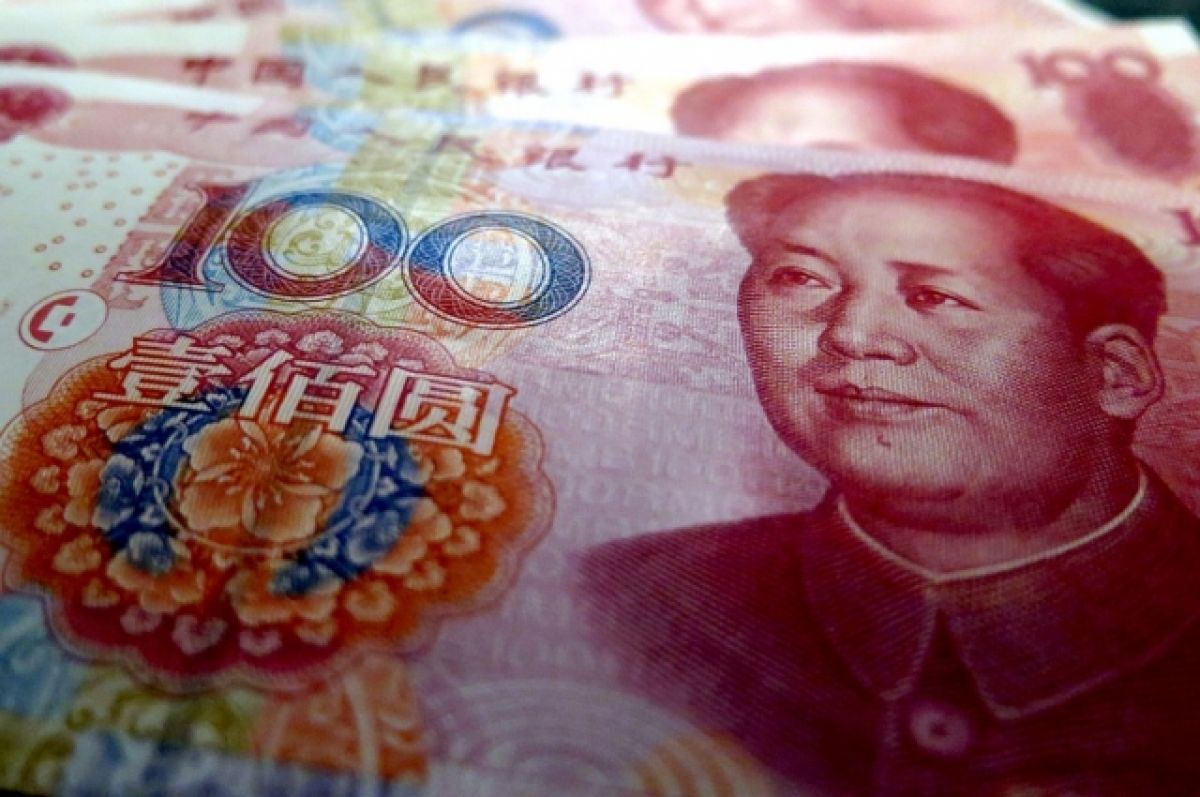 Центробанк КНР понизил курс юаня к доллару до минимума с июня 2020 года