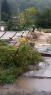 Потоки воды смыли мост в Приморье.