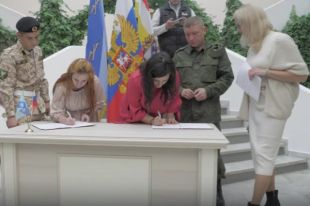 В Курской области одновременно женились 14 мобилизованных