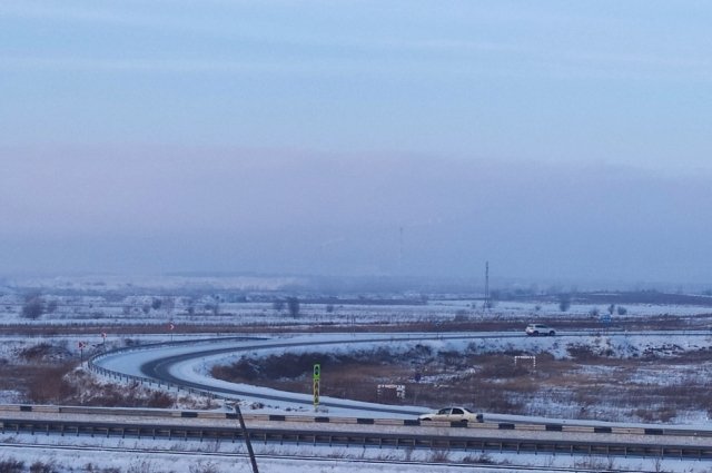 Так Красноярск выглядел днем 2 января со стороны загородной трассы.