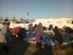 Ну, а это фотографии из Тобольска. Люди набирают святую воду.