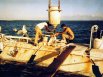 Жак Пикар и Эрнест Виджил загружают железную дробь, которая используется в качестве балласта судна, на борт батискафа «Триест».
