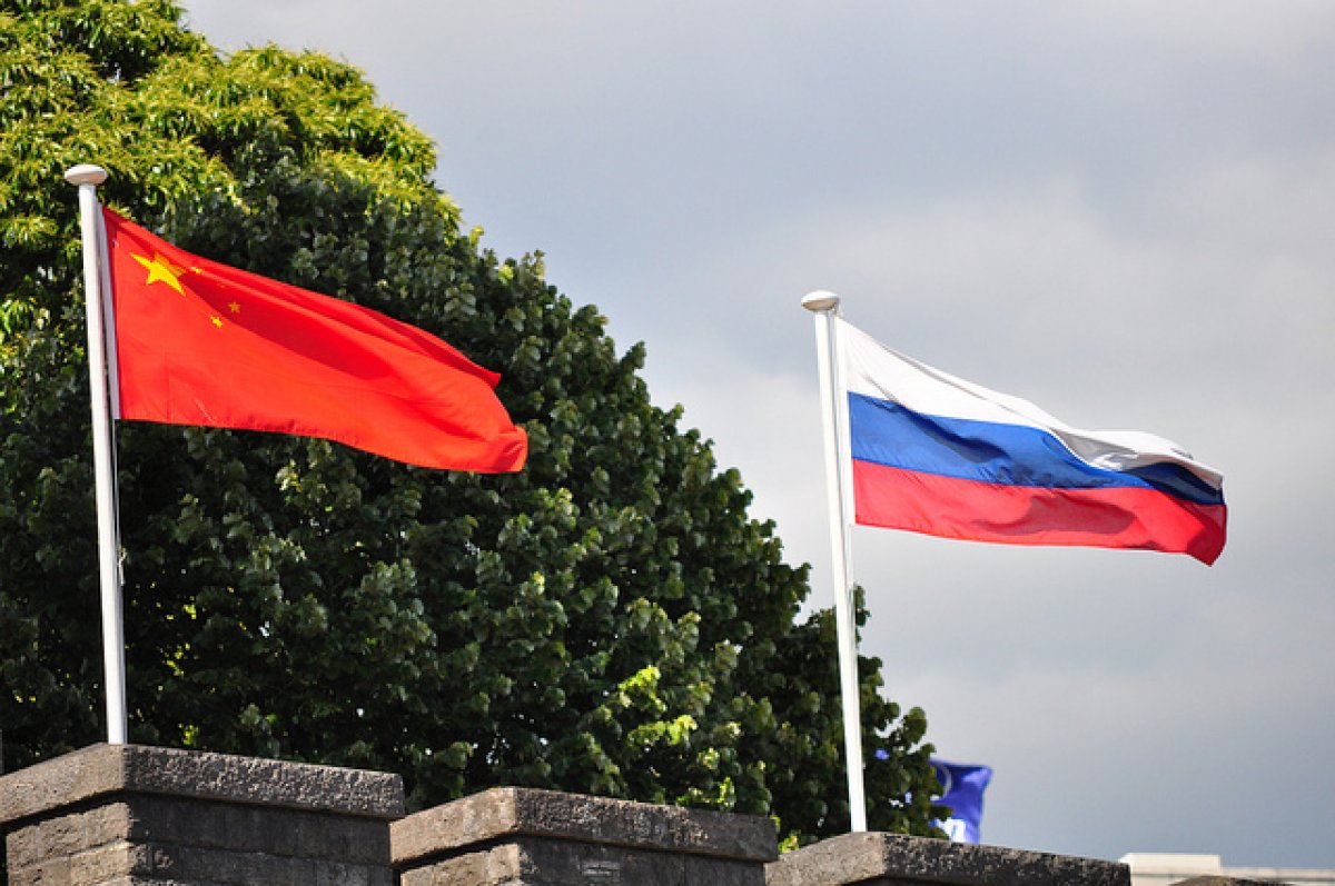 МИД КНР выразил готовность работать с Россией для прогресса в отношениях