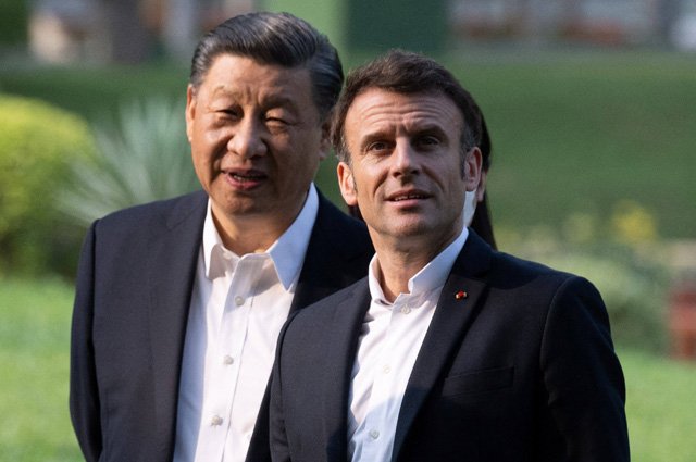 Президент Китая Си Цзиньпин и президент Франции Эммануэль Макрон.