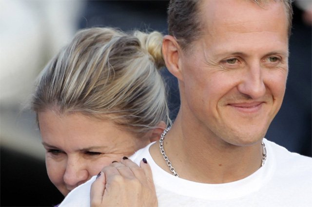 Михаэль Шумахер с супругой. 2011 г.
