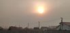 Красное солнце из-за смога, Тюмень, май, 2023.