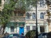Пострадавший 7 сентября дом на улице Пушкинской. Окна заклеили пленкой.