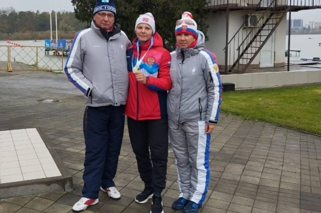 Анастасия Долгова  со своими тренерами Вадимом  и Ириной  Никитенко.