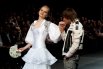 Дима Билан и модель Лена Кулецкая на модном шоу Шиян и Рудковской 23 марта 2009 года. 