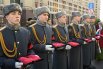 Военнослужащие держат на подушках государственные награды председателя Верховного суда РФ Вячеслава Лебедева после церемонии прощания в Колонном зале Дома Союзов в Москве.