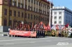 Полк пошёл традиционно, держа в руках большой плакат. 