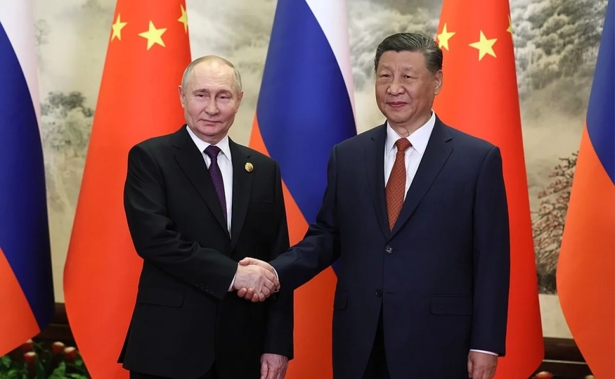 Первый день визита Путина завершился неформальным общением с Си Цзиньпином