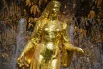 Грузия. Для образа позировала первая красавица Тбилиси - Родам Амирэджиби. Она тоже облачена в традиционный наряд, в руках держит грозди винограда, напоминая о главном сокровище республики - грузинском виноделии.