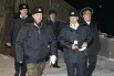 17 февраля 2004 год. Президент России Владимир Путин (в центре) во время рабочей поездки по Мурманской области посетил главную военно-морскую базу Северного флота в Североморске с целью присутствовать на учениях. Его сопровождали министр обороны РФ Сергей Иванов (слева), главком ВМФ РФ Владимир Куроедов  (справа).