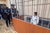 Мать в зале суда.