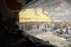 В специальных залах с атмосферными декорациями на экранах показывают фильмы о важных вехах войны, после чего экран «уезжает» и зрители видят красивые диорамы.