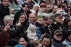 На трибунах - ветераны и почётные гости.