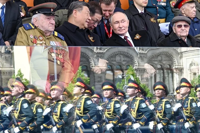 Президент РФ Владимир Путин и председатель КНР Си Цзиньпин (в центре слева) на Красной площади в Москве на военном параде, посвященном 80-летию Победы.