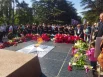 Мемориал завален цветами.