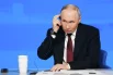 Президент РФ Владимир Путин отвечает на вопросы во время специальной программы «Итоги года».