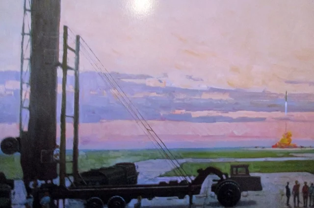 На картине – запуск ракеты на полигоне.