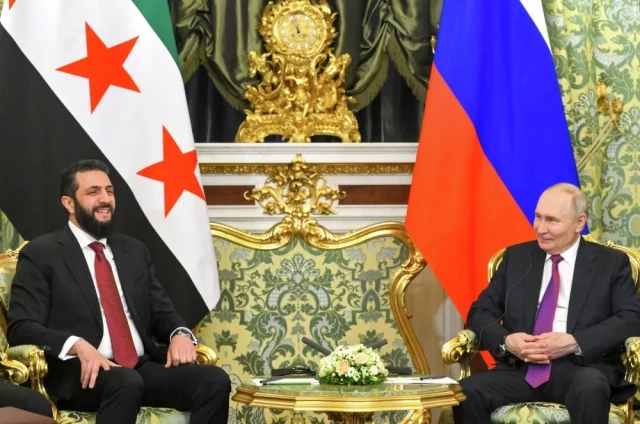 28 января 2026 г. Президент РФ Владимир Путин и президент Сирии Ахмед аш-Шараа (слева) во время встречи в Москве.