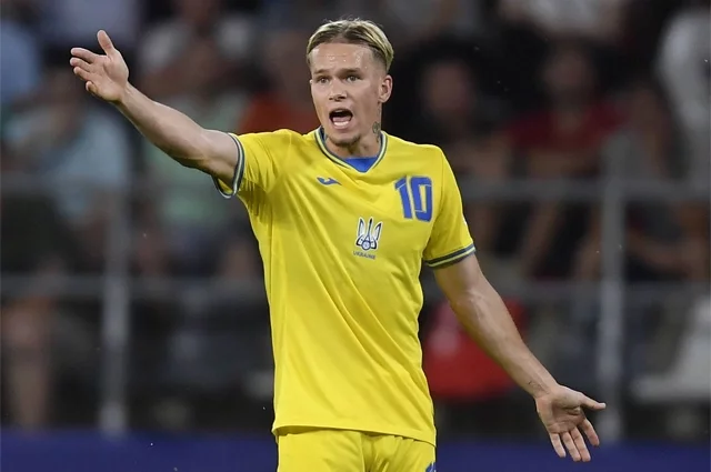 Михаил Мудрик.