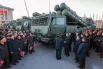 Церемония передачи северокорейскими рабочими пятидесяти РСЗО в адрес армии и съезда партии.