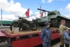 Советский тяжёлый мотоцикл М-72 и танк Т-34.