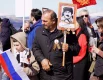 Многие северяне пришли с портретами своих героев.