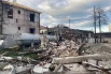 Территория рядом со взорванной заправкой.