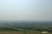 Вдали на Николаевской сопке даже не видно флаг.
