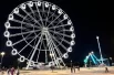 Колесо обозрения в парке аттракционов на Волшебной Горе