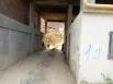 заехать в сторону разрушенного строения можно теперь лишь через узкий туннель, так как внешняя часть улицы теперь плотно застроена.