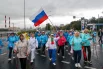 Каждый участник получил на старте палки для ходьбы и… дождевик. Погода утром 5 сентября была уже осенней.